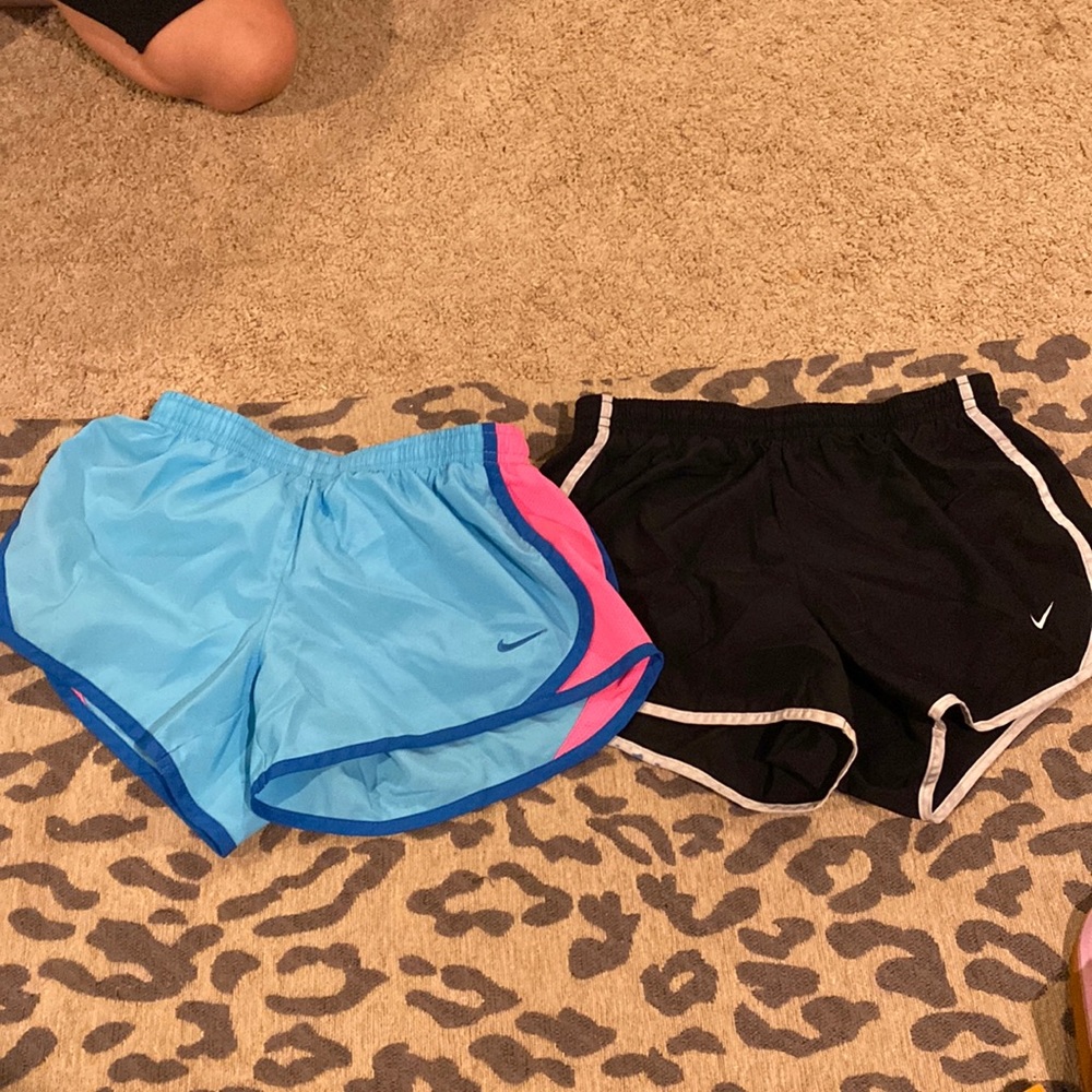 2-pairs of girls Nike shorts.